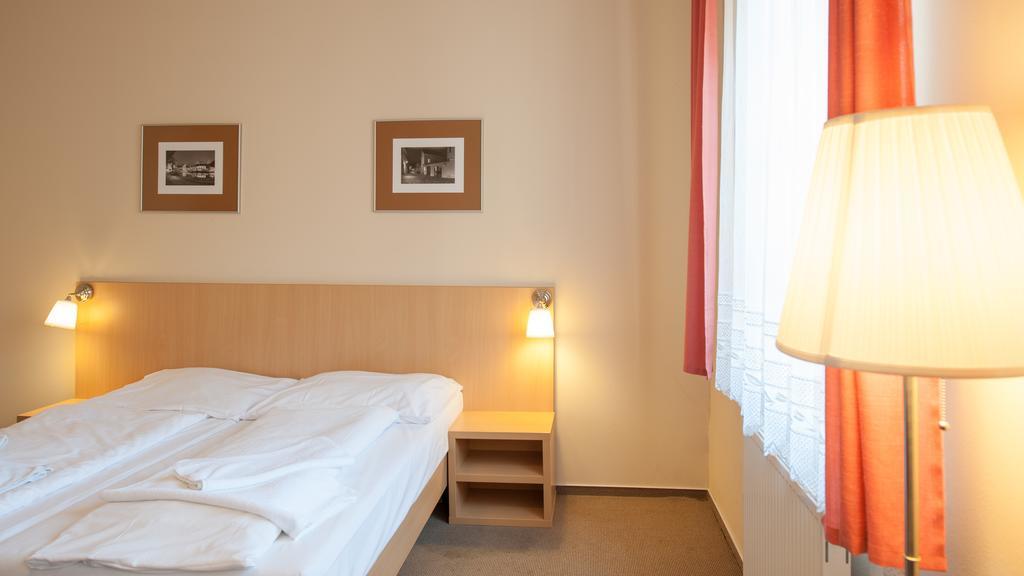 Hotel V Centru Ческе-Будеёвице Номер фото